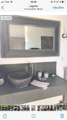 a bathroom counter with a sink and a mirror at Les Esperelles in Lagnes