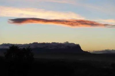 a cloud formation in the sky at sunset at L'Enclos in Aix-en-Provence