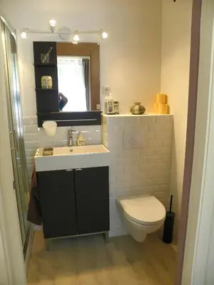 a bathroom with a sink and a toilet at Provencal Vintage Cocoon in LʼIsle-sur-la-Sorgue