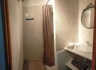 a bathroom with a shower and a sink at La Sarriette - Chambres d'hôtes et gîte d'étape à Eygalières in Eygalières