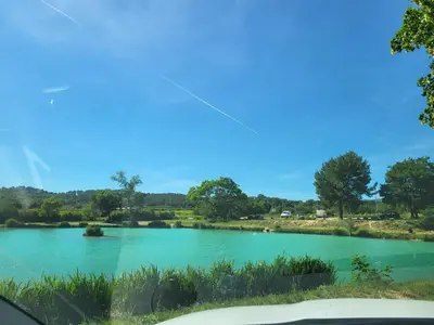 a view of a lake from a car at Mas Nina Rosa in Mazan