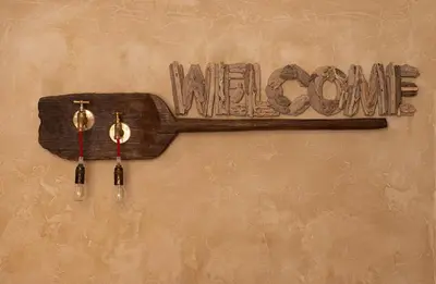 a sign on a wall with the words wolf cave at Maison d'hôtes Une hirondelle en Provence in Roussillon