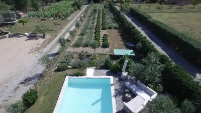 an overhead view of a garden with a swimming pool at Au Havre De Paix sainte victoire vauvenargues in Vauvenargues