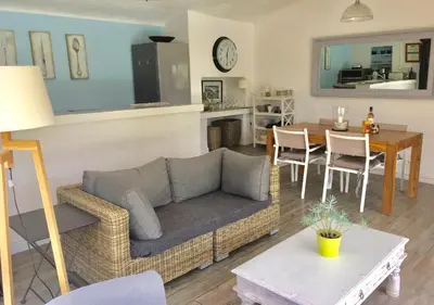 a living room with a couch and a table at Le Petit Bastidon - Private pool - Gordes in Gordes