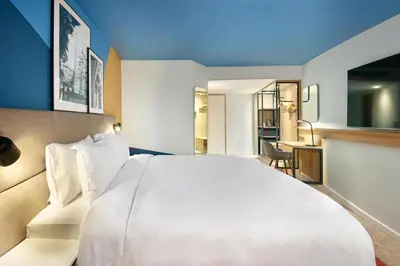 a store with chairs and tables in a room at Radisson Hotel Aix En Provence in Aix-en-Provence