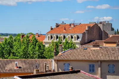 a view of roofs of buildings in a city at Appart Hypercentre CLIM 2chb QuartierChic in Aix-en-Provence