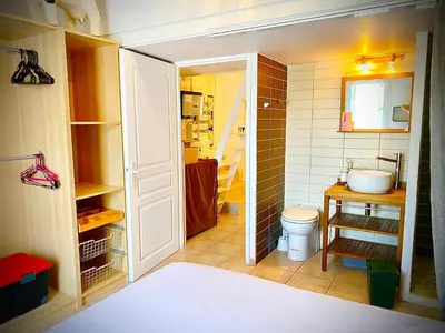 a small bathroom with a sink and a toilet at Villa Felin Feline in LʼIsle-sur-la-Sorgue