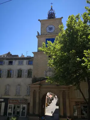 a clock tower on top of a building at Grand Hôtel De La Poste in Salon-de-Provence