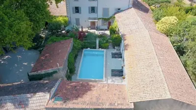 an overhead view of a swimming pool on a roof at La Bastide des Songes - Demeure d'hôtes in Robion en Luberon
