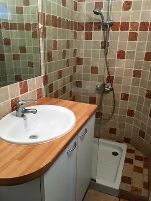 a bathroom with a sink and a shower at Séjour Authentique et provençal in Fontaine-de-Vaucluse