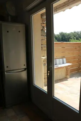 a bathroom with a toilet and a shower stall at L'Orgalière Alpilles in Orgon