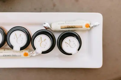 a white box with four tubes of toothbrushes at Le Mas De La Rose - Teritoria in Orgon