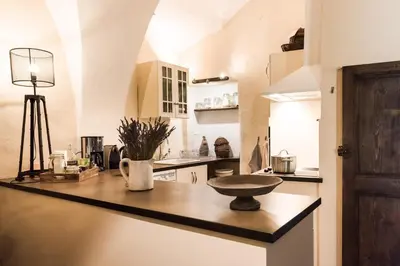 a kitchen with a counter with a bowl on it at Su Lei Campanes in Lauris