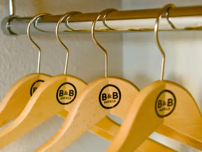 four wooden rackets with the words bkbarma on them at B&B HOTEL Aix-en-Provence Pont de l'Arc in Aix-en-Provence