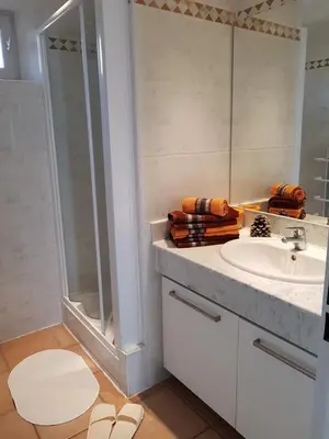 a bathroom with a sink and a shower at Bastidon Provencal in Gordes