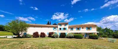 a large house with a large yard at Cante Grillet - 295 Chemin des Contards - 84480 Lacoste in Lacoste