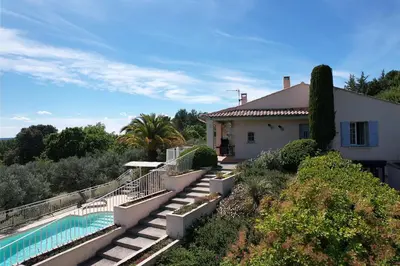 a house with a swimming pool next to a house at vacation home with private swimming-pool and a nice view on the luberon mountain, located in merindol, 8 persons in Mérindol