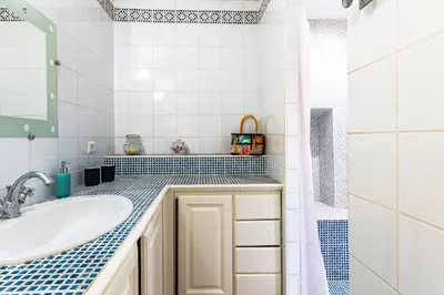 a bathroom with a sink and a shower at Belle De Jour -A Provencal gem Private heated pool in Gordes