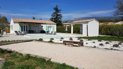 a villa with a swimming pool and a house at Villa Chapperon in Bédoin
