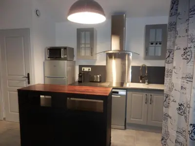 a kitchen with a counter top in a room at Gite Le city en Provence in Lambesc