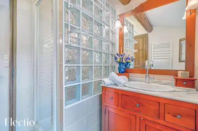 a bathroom with a sink and a shower at Mas La Miellerie - Charme Authentique et Nature in Simiane-la-Rotonde
