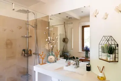 a bathroom with a sink and a shower at Maison d’Etienne in Lacoste