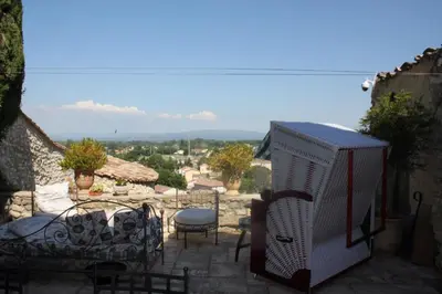 a view of a balcony with a table and chairs at Château de Vedène in Vedène