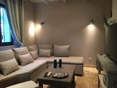 a living room with a couch and a coffee table at Mas De Gordes in Gordes