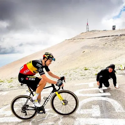 a man riding a bike on a dirt road at Chambres entre Ventoux et luberon in Sault-de-Vaucluse