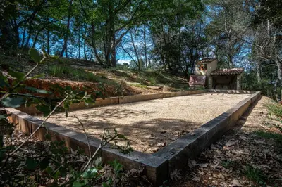 a set of concrete steps leading up to a house at Stunning panoramic views and heated pool in Roussillon in Roussillon