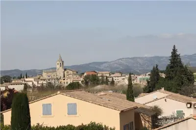 a view of a town with houses and a church at Vakantiehuis Mazan - Le Haut Colombier in Mazan