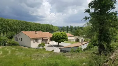 an aerial view of a house in a field at Les Prairies de l'Encrême in Céreste