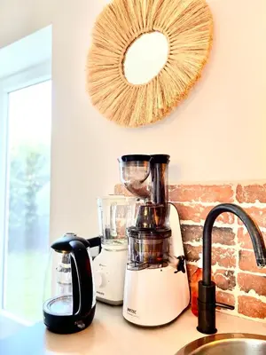 a kitchen counter with a blender and a mirror at villa Luberon in Saint-Saturnin-les-Apt