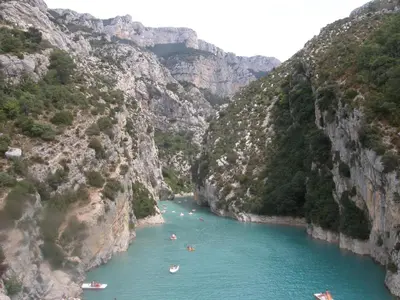 a group of people rafting down a river in a canyon at Fleur des îles in Saint-Michel-lʼObservatoire