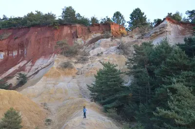 a painting of a person standing on a mountain at Fleur des îles in Saint-Michel-lʼObservatoire