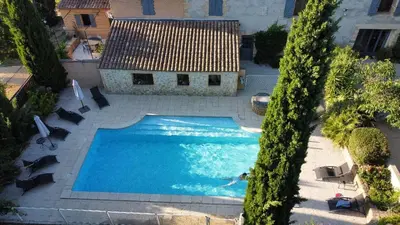 an overhead view of a swimming pool in a backyard at Le Mas des Vergers in Salon-de-Provence