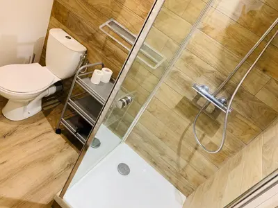 a bathroom with a toilet and a shower at Cassis Studio in Aix-en-Provence