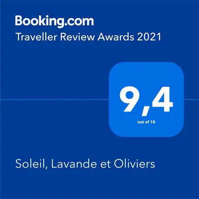 a screenshot of a phone with the travel review awards at Appartement 