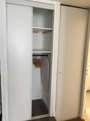 a walk in closet with two closets and a door at LEYDET in Aix-en-Provence