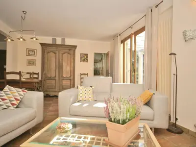 a living room with a couch and a table at Villa in Crillon-le-Brave near Mont Ventoux in Crillon-le-Brave