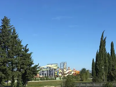 a park with trees and a roller coaster at Villa in Crillon-le-Brave near Mont Ventoux in Crillon-le-Brave