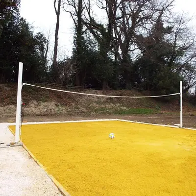 a soccer ball sitting on top of a soccer field at Gîte de Léonie Moulin de Tartay en Avignon in Avignon