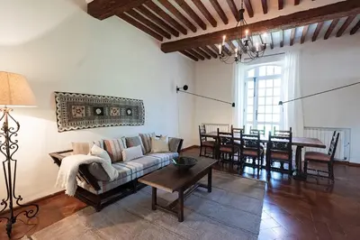 a living room with a couch and a table at Domaine de Saint Pons in Villars