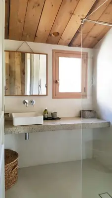 a bathroom with a sink and a mirror at La petite maison in Aix-en-Provence