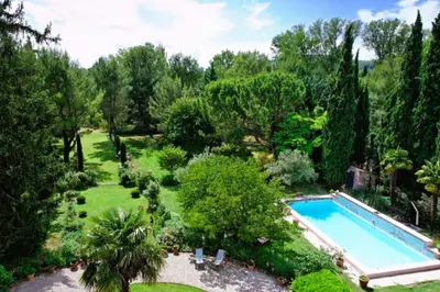 an overhead view of a garden with a swimming pool at Le Domaine de Saint Veran in Orgon