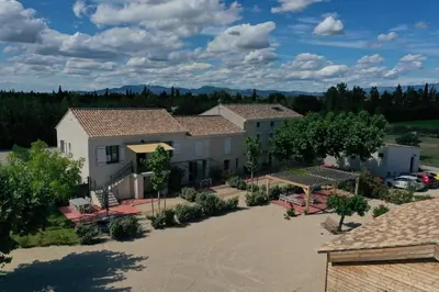 an aerial view of a house with a driveway at Mas Eléhis Gîtes en Provence in Pernes-les-Fontaines