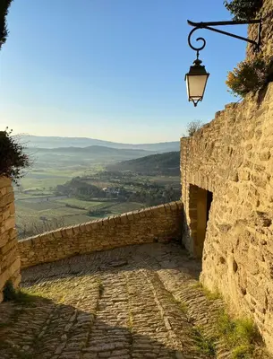 an aerial view of a city with buildings at Bastidon à Gordes avec piscine in Gordes
