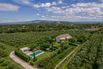 an aerial view of a estate with a swimming pool at Mas de Canfier in Robion en Luberon