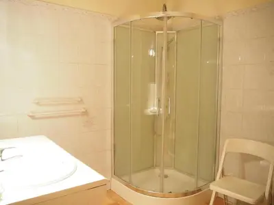 a glass shower in a bathroom with a sink at Sunny Provence Home with Terrace in Monteux