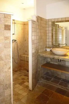 a bathroom with a sink and a tub and a shower at Premium villa with garden and pool, Lambesc in Lambesc
